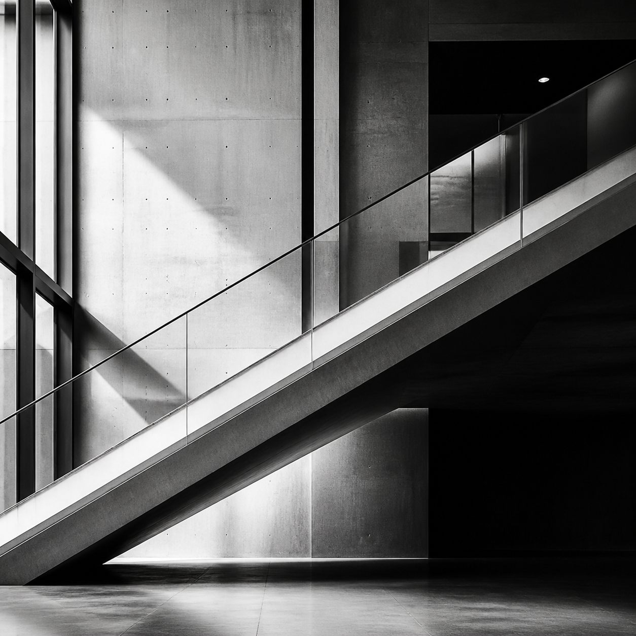 Monochrome architectural staircase with a clear upward direction
